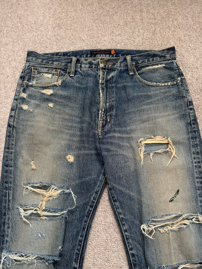 SS05 Undercover "But Beautiful" 60 Distressed Patch Denim Jeans