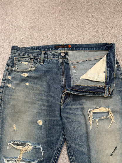 SS05 Undercover "But Beautiful" 60 Distressed Patch Denim Jeans