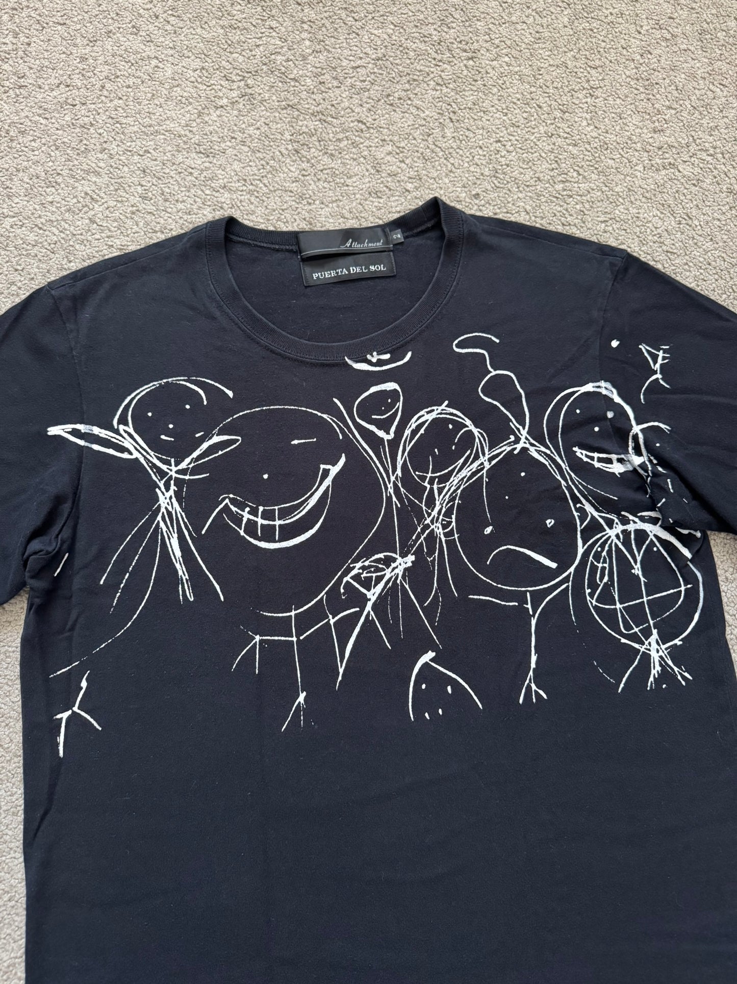 Attachment x Puerta Del Sol Figure Graphic T Shirt