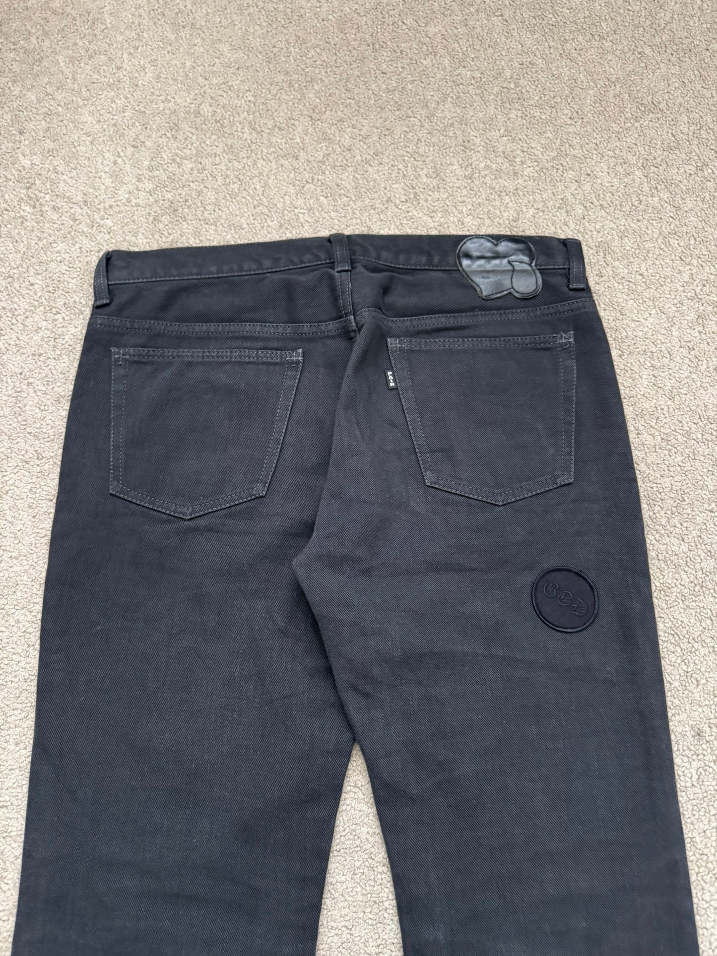 AW04 Number (N)ine "Give Peace A Chance" Patch Denim Jeans