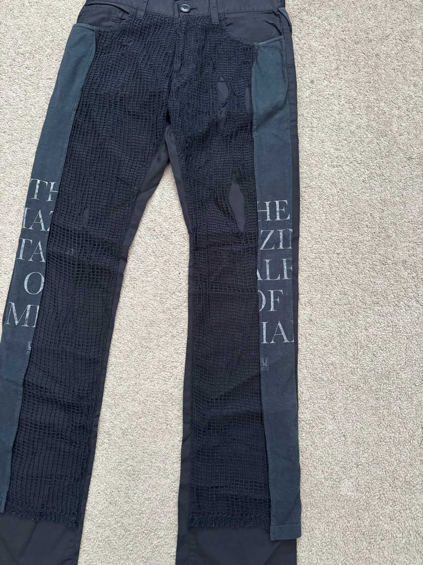 SS06 Undercover Tale Of Zamiang Netted Hybrid Pants