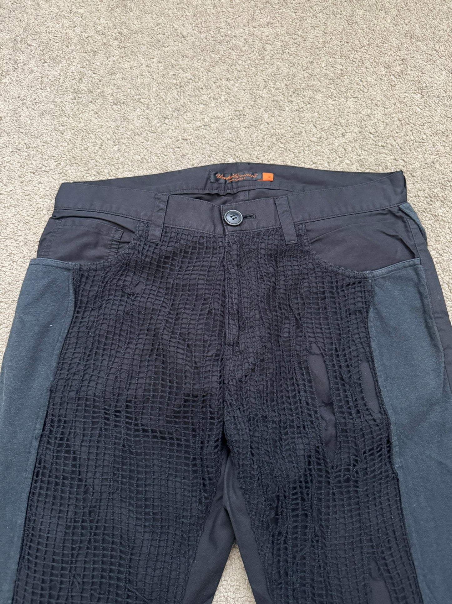 SS06 Undercover Tale Of Zamiang Netted Hybrid Pants