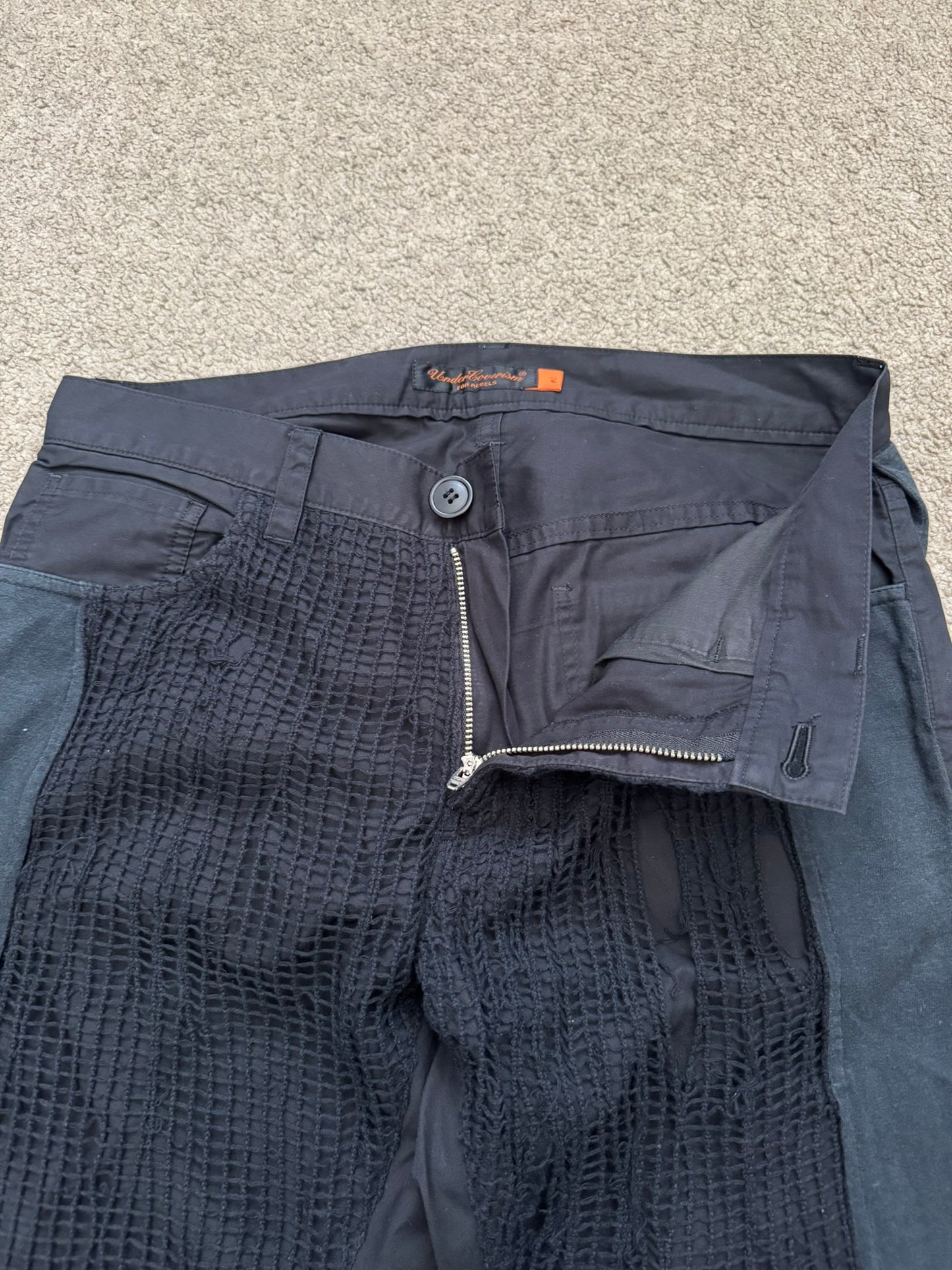 SS06 Undercover Tale Of Zamiang Netted Hybrid Pants