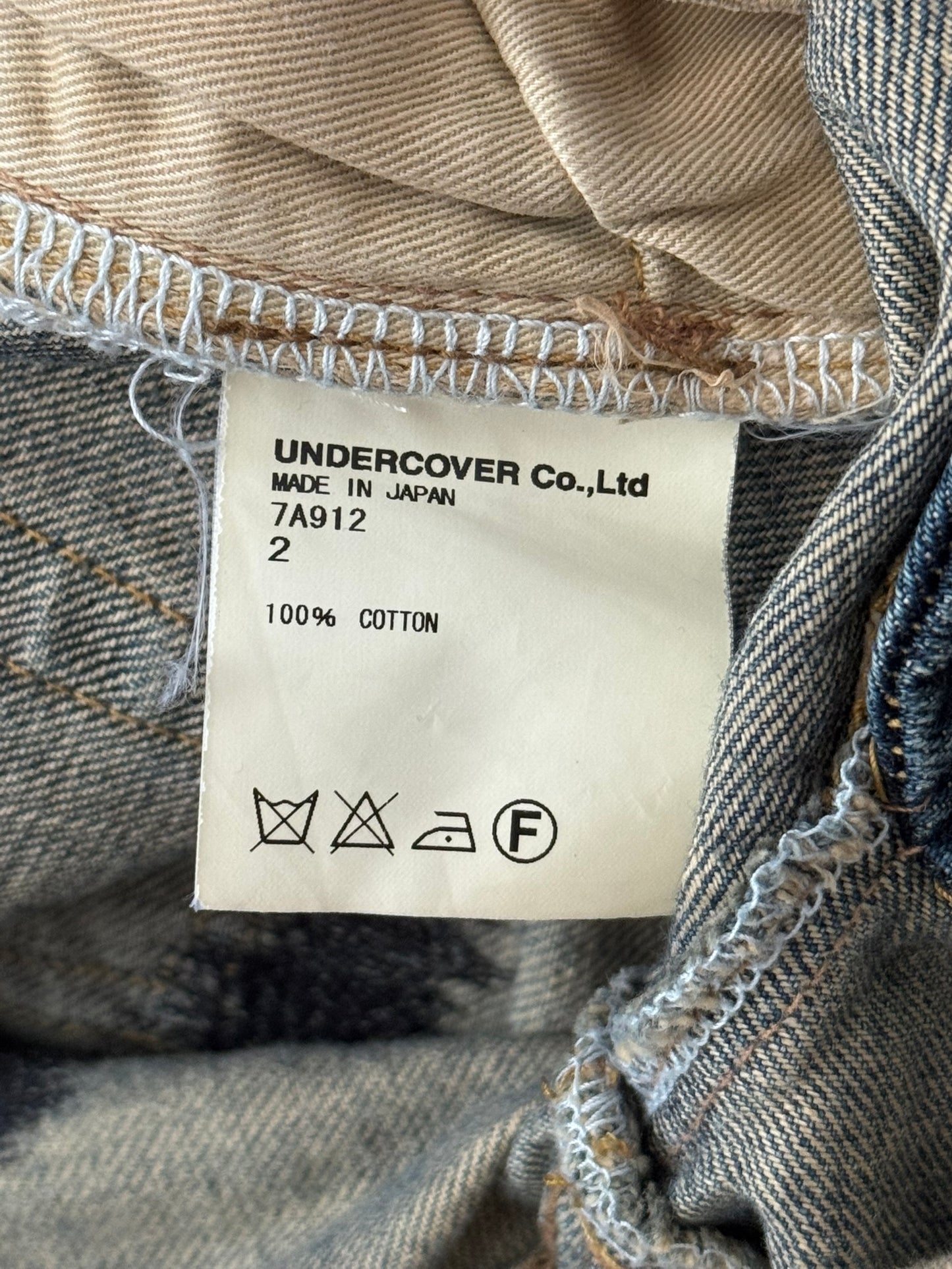 AW07 Undercover "Knit" Apple Fang Embroidered Denim Jeans