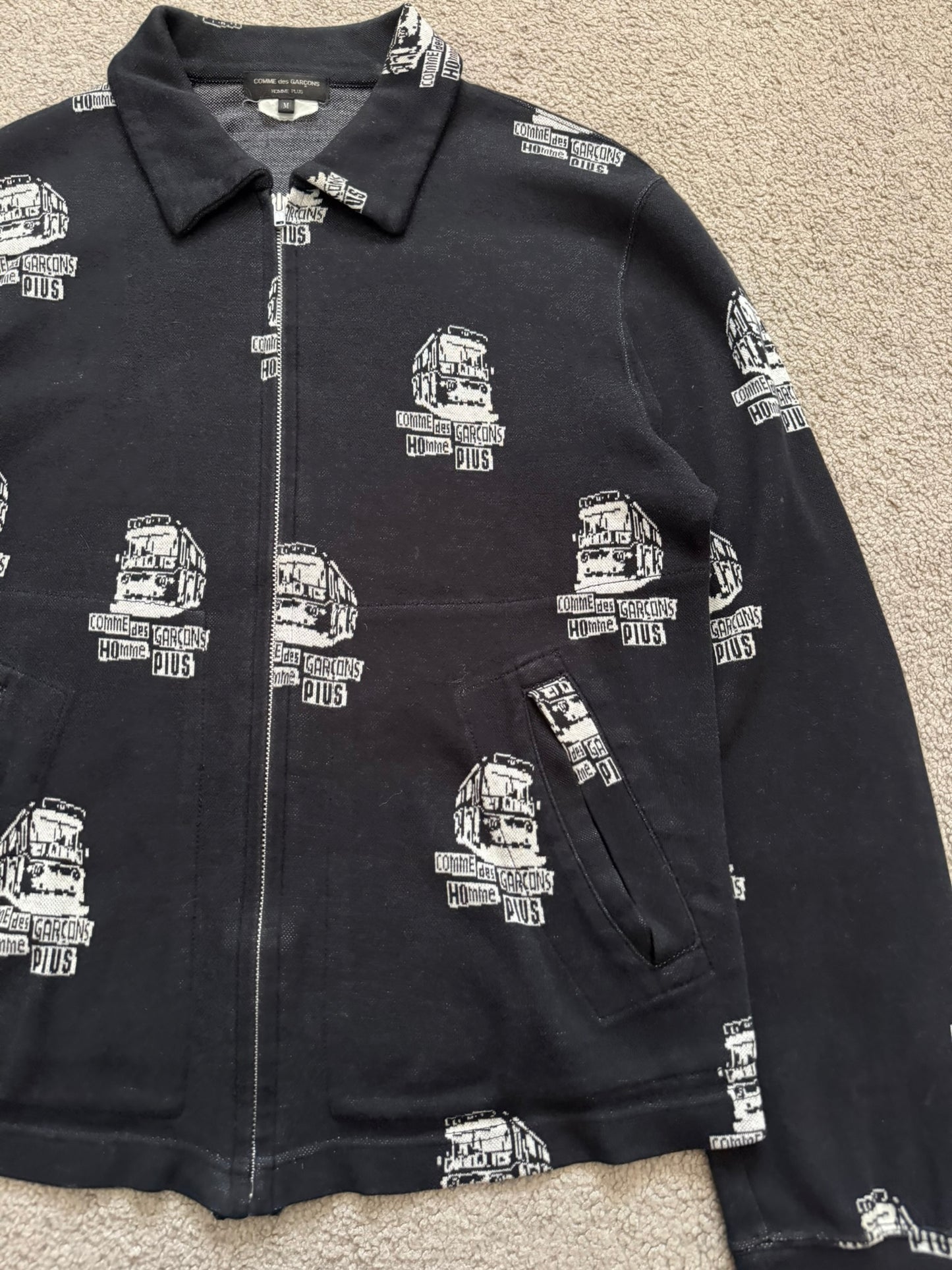 AW08 Comme Des Garcons Homme Plus x Jamie Reid Logo Bus Jacket