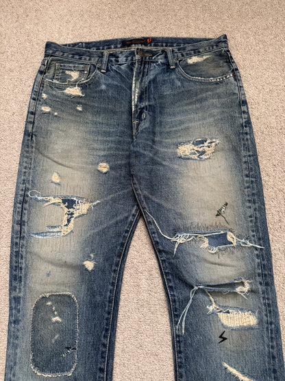 SS05 Undercover "But Beautiful" 60 Distressed Patch Denim Jeans