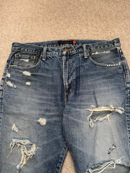 SS05 Undercover "But Beautiful" 60 Distressed Patch Denim Jeans