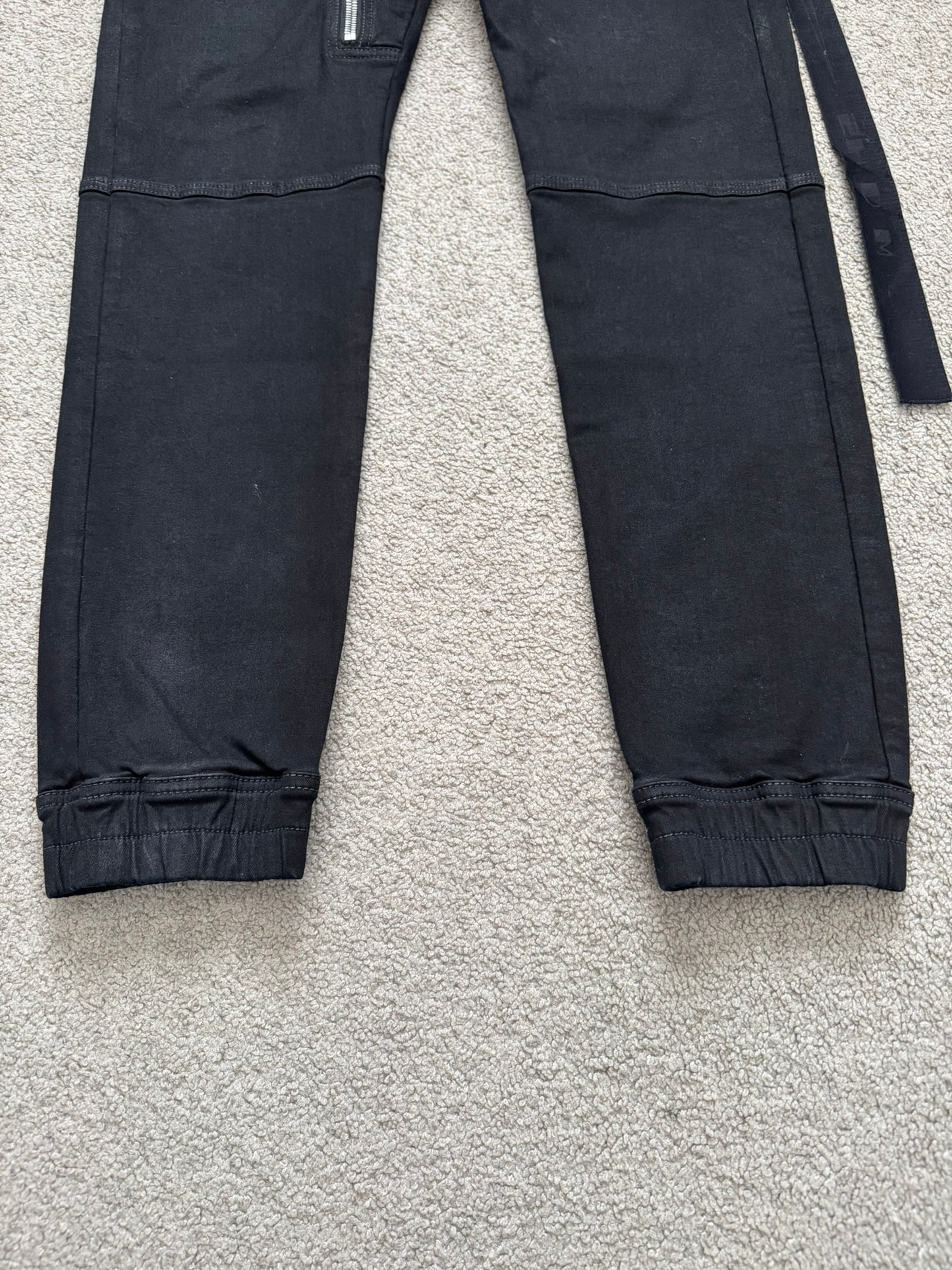 FW23 Rick Owens DRKSHDW Black Waxed Aircut Jogger Denim Jeans