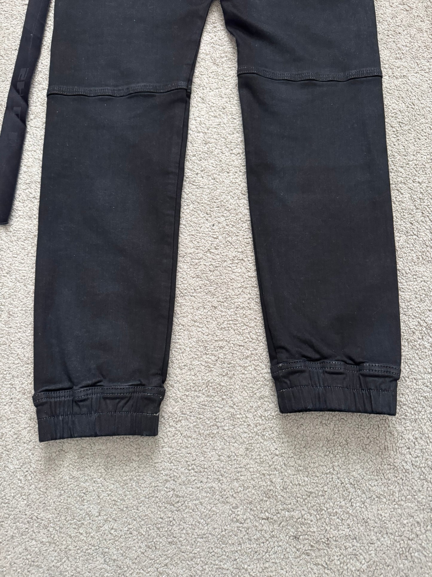 FW23 Rick Owens DRKSHDW Black Waxed Aircut Jogger Denim Jeans