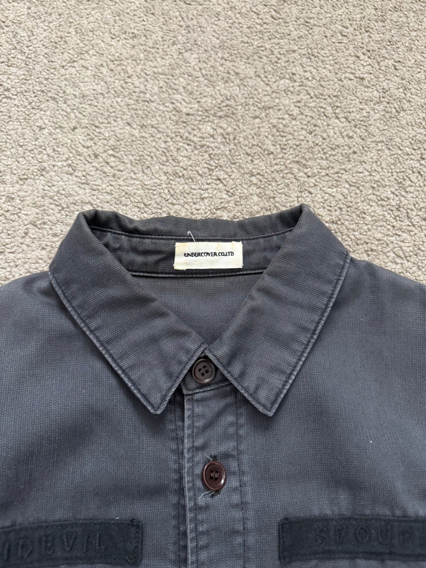 AW11 Undercover "Antidevil Security" Skull Hybrid Army Shirt