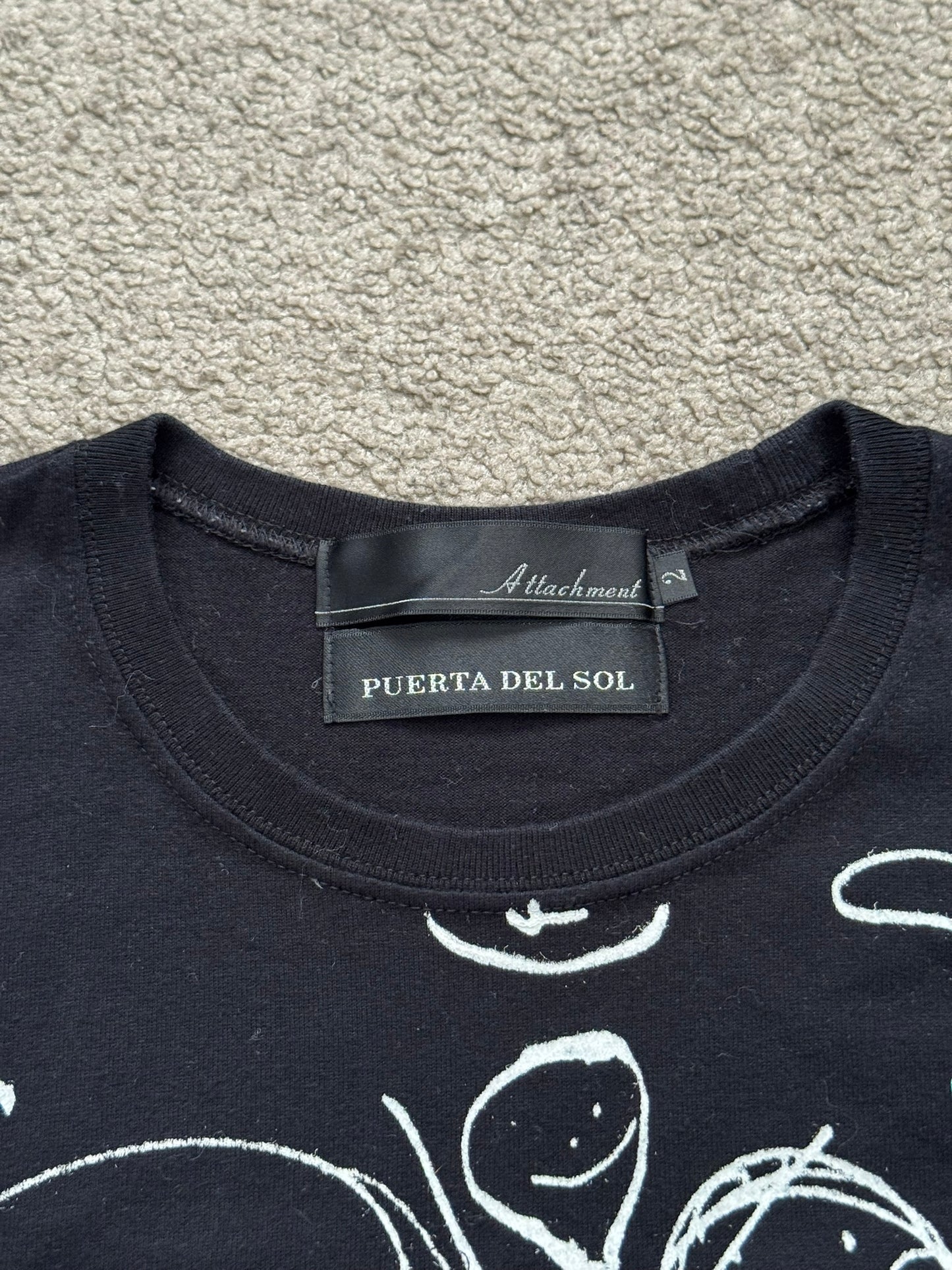 Attachment x Puerta Del Sol Figure Graphic T Shirt