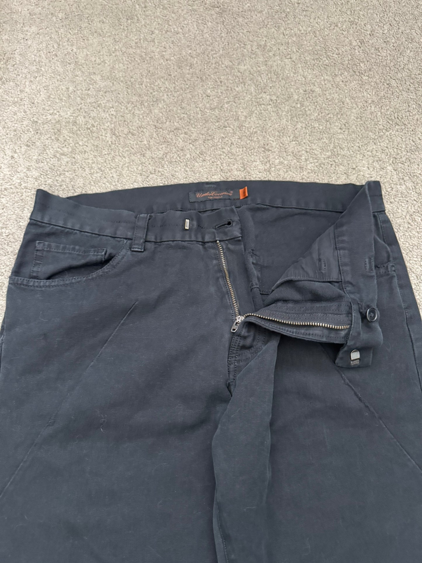 AW06 Undercover "Guruguru" Paneled Crust Frayed Jeans