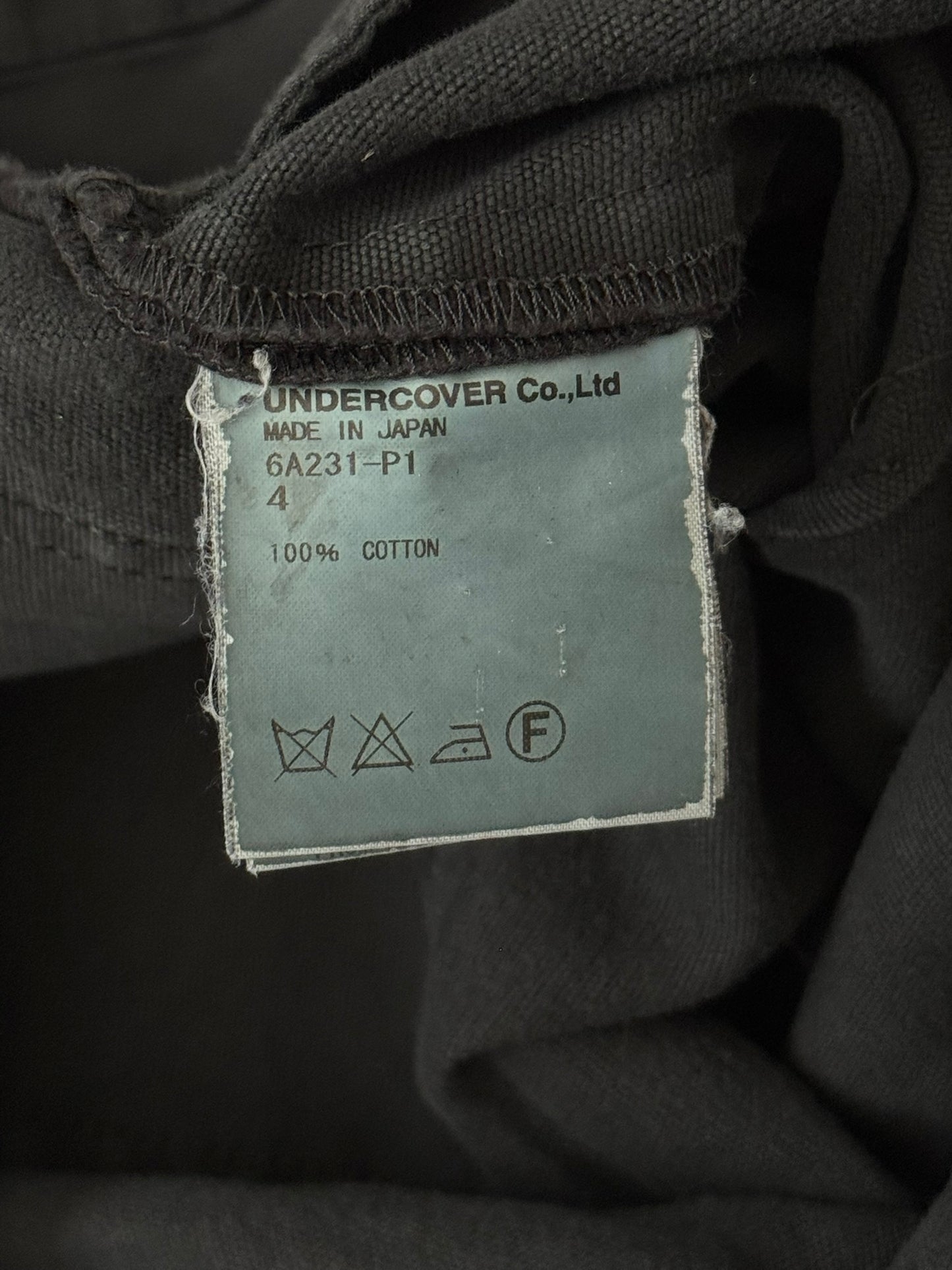 AW06 Undercover "Guruguru" Paneled Crust Frayed Jeans