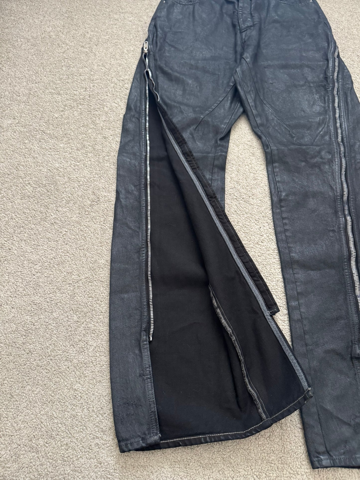 SS24 Rick Owens Mainline "Lido" Waxed Bolan Banana Cut Denim Jeans