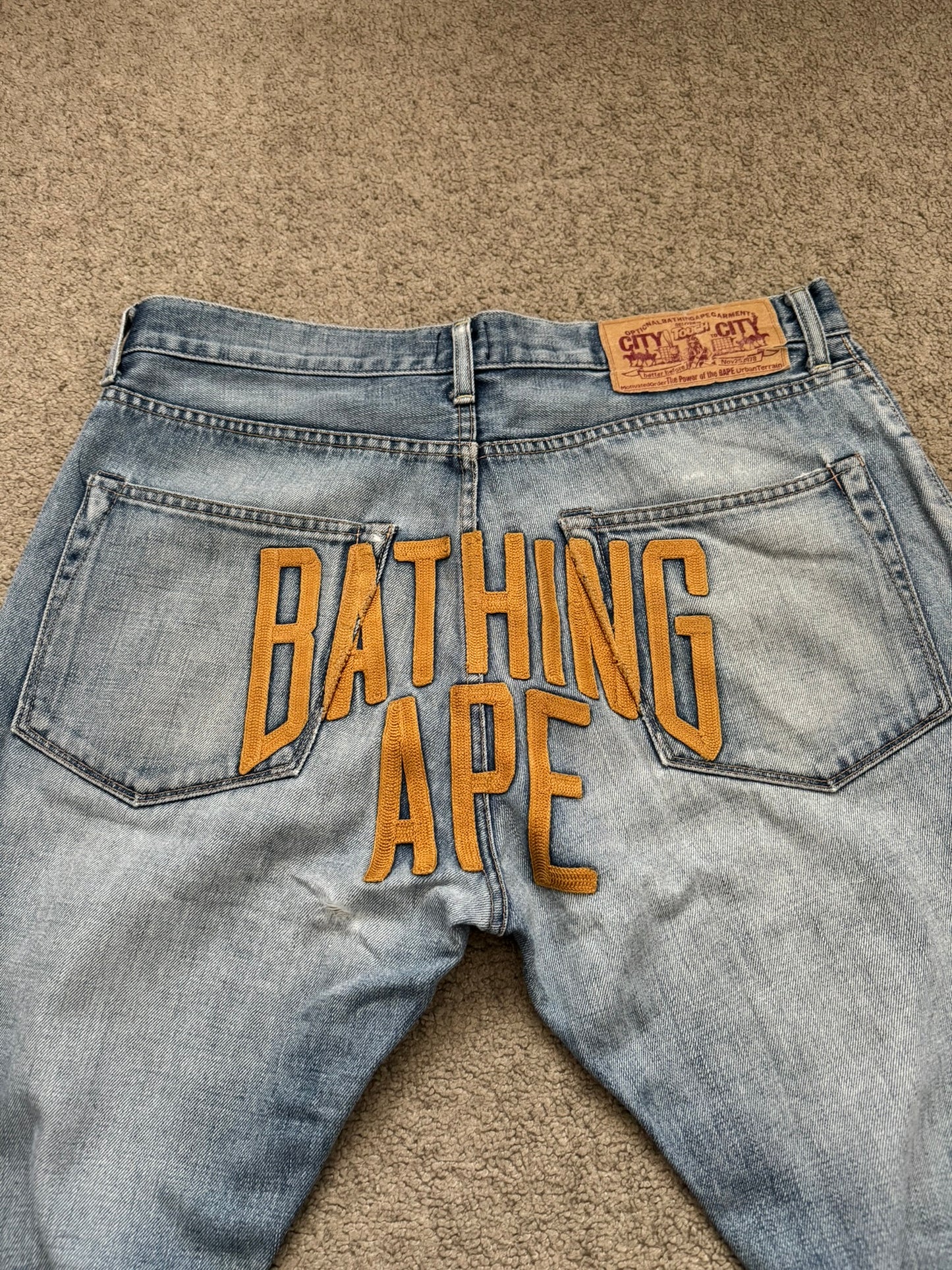 Vintage BAPE "Bathing Ape" Text Logo Patch Denim Jeans